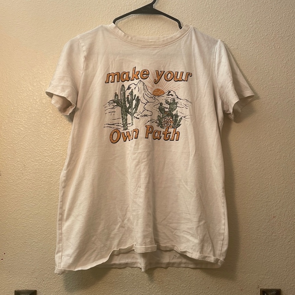 A small Tres Bien shirt.